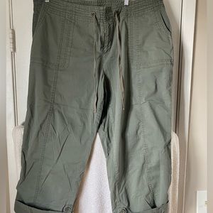 Worn once cargo Capri pants. Olive green roll up with side buttons.